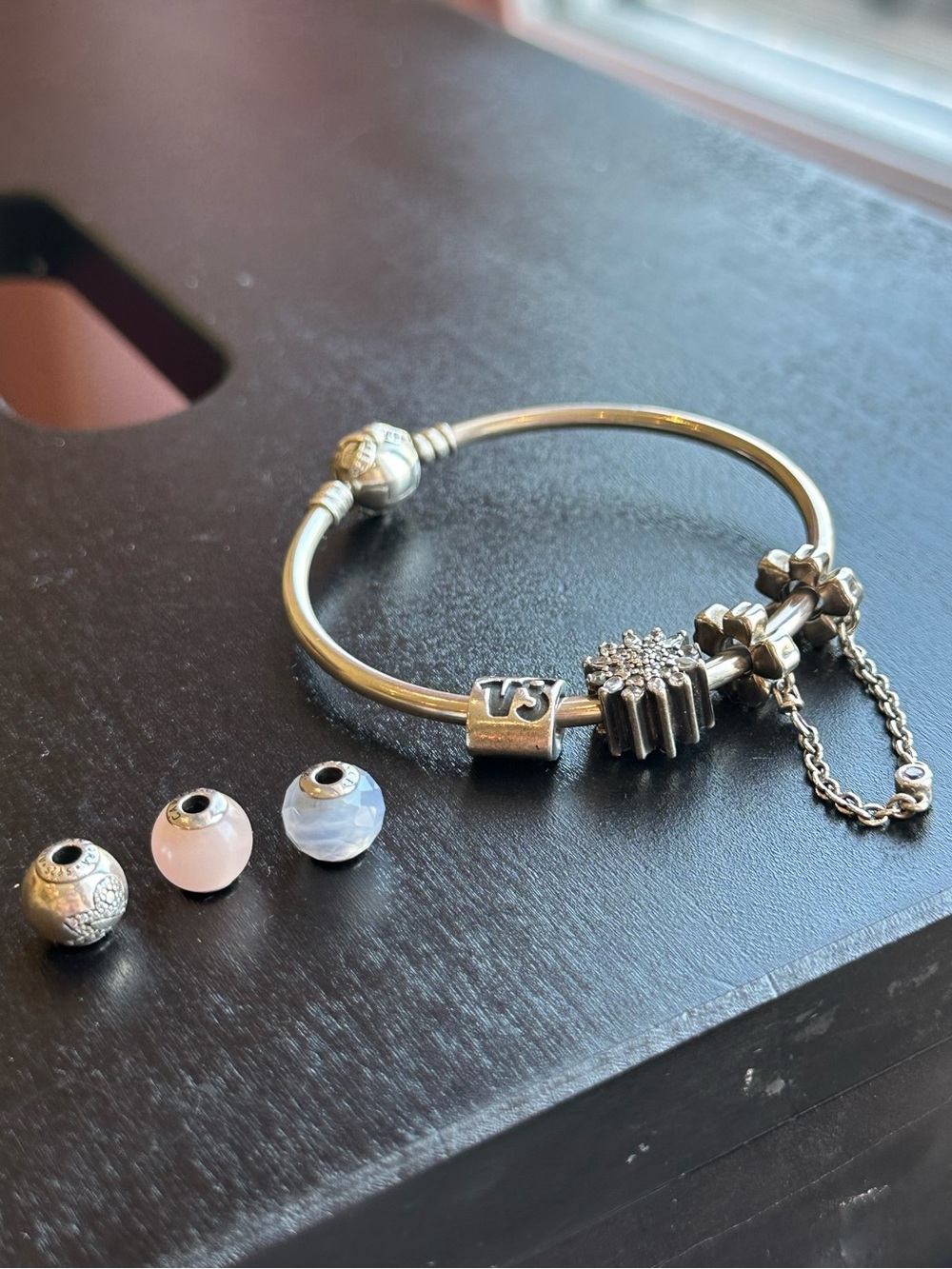 Pandora Sterling Silver Bracelet with 3 extra charms